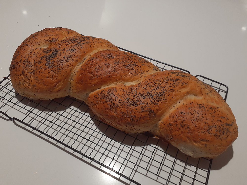 Freshly baked loaf of breadwith poppy seed