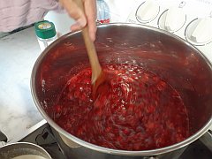 Stirring the raspberry jam